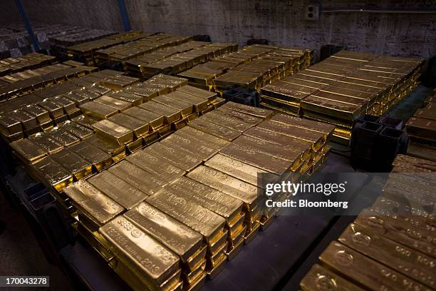 Gold bars, worth hundreds of thousands of dollars each, sit in a vault at the United States Mint at West Point in West Point, New York, U.S., on...
