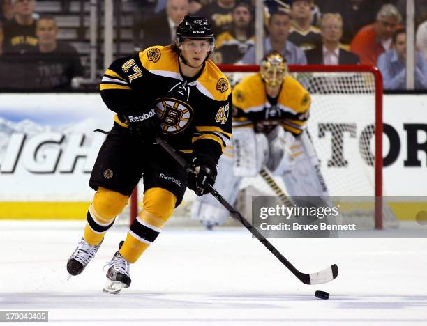 Torey Krug of the Boston Bruins skates with the puck against the Pittsburgh Penguins during Game Three of the Eastern Conference Final of the 2013...