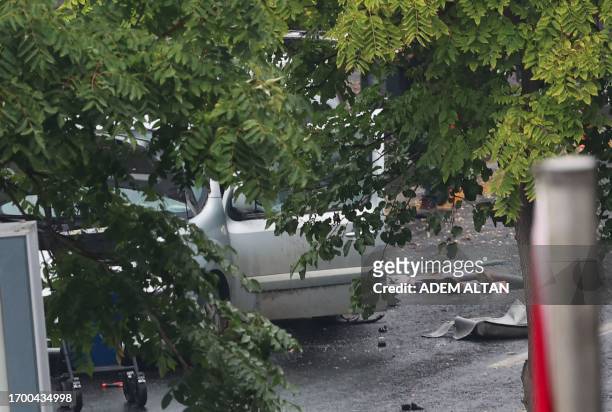 This photograph shows the commercial vehicle used by the two attackers as members of Turkish Police Special Forces secure the area near the Interior...