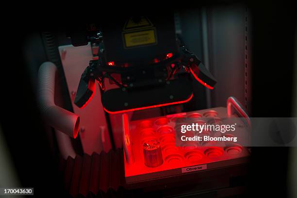 Die used to strike coins is "frosted" using a laser at the United States Mint at West Point in West Point, New York, U.S., on Wednesday, June 5,...