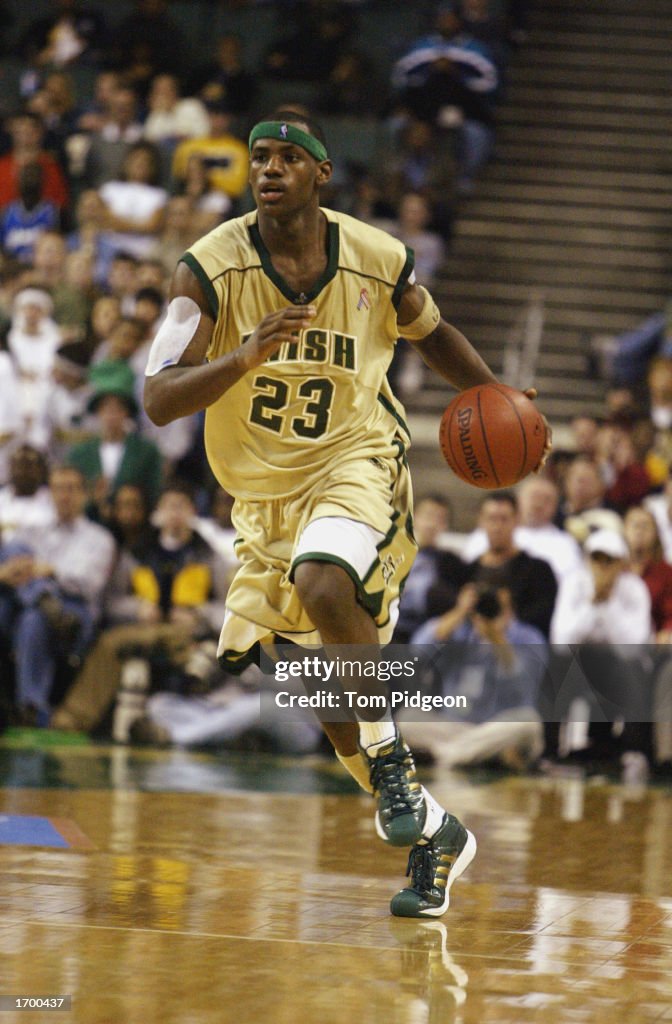 Lebron James dribbles the ball up the floor