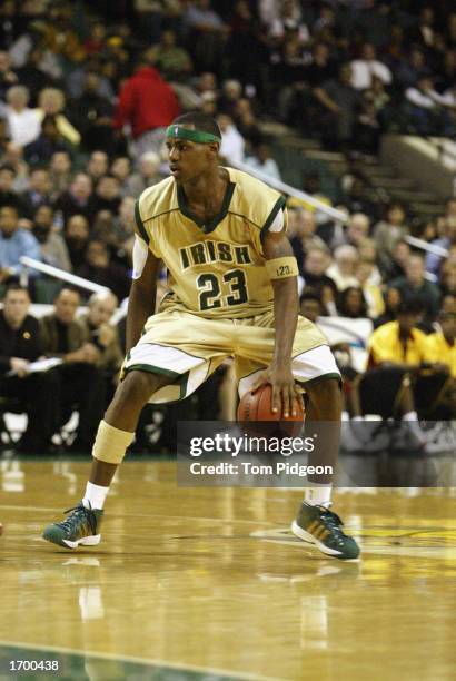 LeBron James of St. Vincent-St. Mary High School dribbles the ball against Oak Hill Academy at the Cleveland State University Convocation Center on...