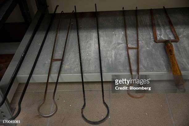 Tongs used in the gold assay process sit under a table at the United States Mint at West Point in West Point, New York, U.S., on Wednesday, June 5,...