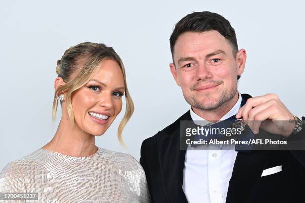 Lachie Neale of the Lions and wife Julie pose for portraits after Lachie Neale was awarded the Brownlow Medal during the 2023 Brownlow Medal at The...