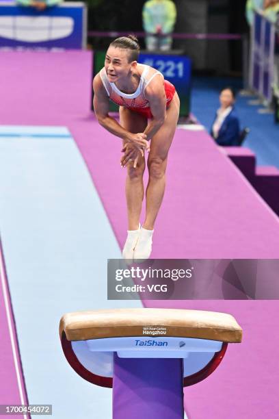 Oksana Chusovitina of Team Uzbekistan competes in the Artistic Gymnastics - Women's Vault Final on day two of the 19th Asian Games at Huanglong...