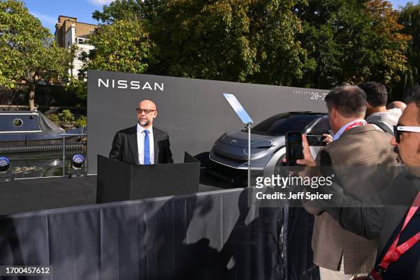 Chairman of AMIEO region, Guillaume Cartier speaks onstage. Nissan launches it's new electric vehicle Concept 20-23 on a barge in the Paddington...