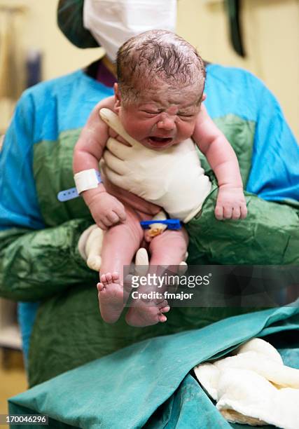 newborn - baby delivery stock pictures, royalty-free photos & images