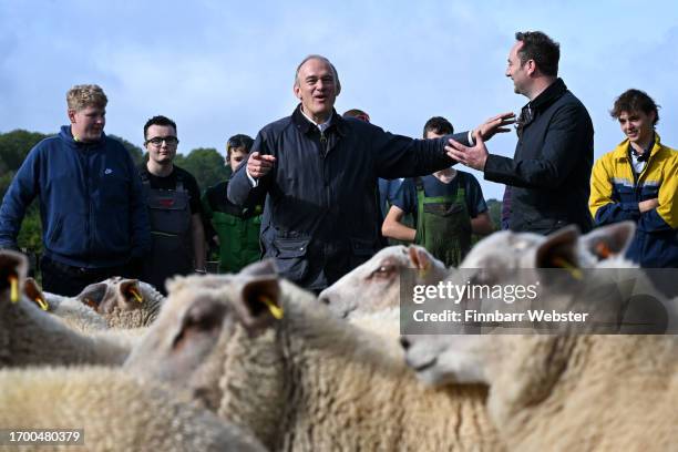 Sir Ed Davey, leader of the Liberal Democrats, looks around the sheep enclosure during a visit to Sparsholt College Hampshire with the party’s...