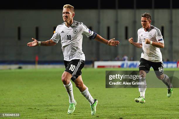 Lewis Holtby of Germany celebrates his team's second goal with team mate Oliver Sorg during the UEFA European Under 21 Championship match between...