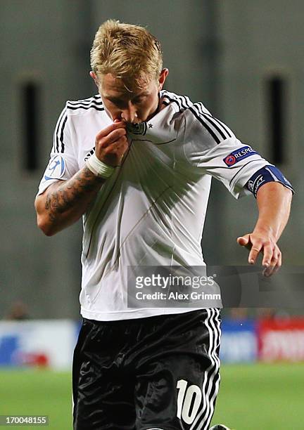 Lewis Holtby of Germany celebrates his team's second goal during the UEFA European Under 21 Championship match between Netherlands and Germany at Ha...