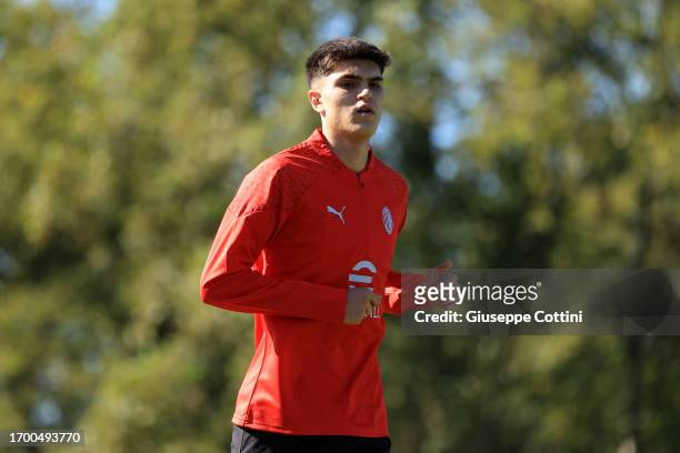 Davide Bartesaghi of AC Milan looks on during an AC Milan training session at Milanello on September 25, 2023 in Cairate, Italy.