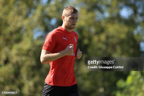 Tommaso Pobega of AC Milan looks on during an AC Milan training session at Milanello on September 25, 2023 in Cairate, Italy.