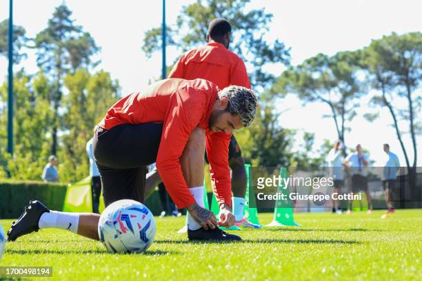 Theo Hernandez of AC Milan looks on during an AC Milan training session at Milanello on September 25, 2023 in Cairate, Italy.