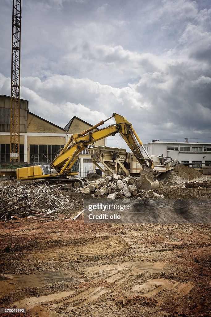 Construction site, excavator