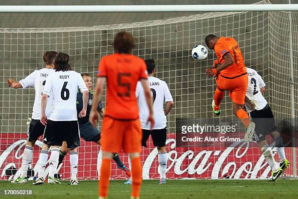 Leroy Fer of Netherlands scores his team's third goal during the UEFA European Under 21 Championship match between Netherlands and Germany at Ha...