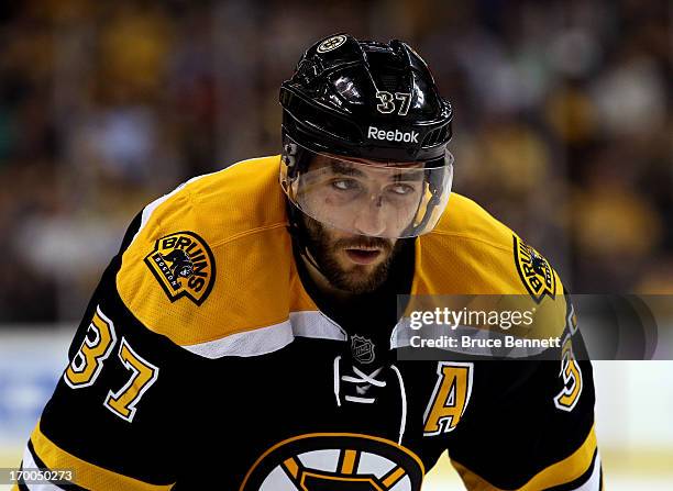 Patrice Bergeron of the Boston Bruins looks on against the Pittsburgh Penguins during Game Three of the Eastern Conference Final of the 2013 NHL...