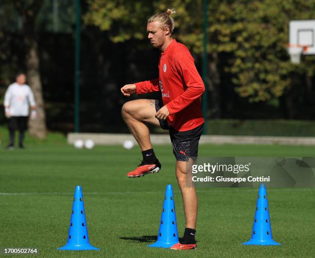 Simon Kjaer of AC Milan in action during an AC Milan training session at Milanello on September 25, 2023 in Cairate, Italy.
