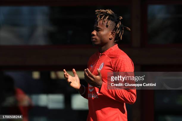 Samuel Chukwueze of AC Milan looks on during an AC Milan training session at Milanello on September 25, 2023 in Cairate, Italy.