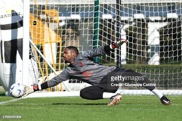 Mike Maignan of AC Milan in action during an AC Milan training session at Milanello on September 25, 2023 in Cairate, Italy.