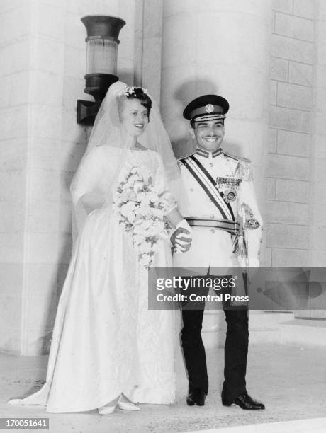 King Hussein and Antoinette Gardiner leaving the Zahran Palace after their wedding ceremony, Amman, Jordan, 29th May 1961.