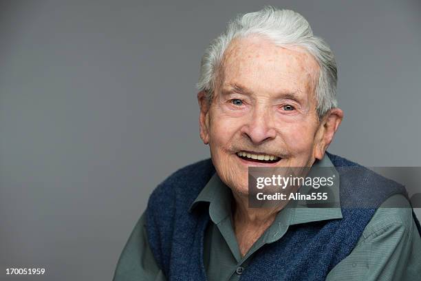 headshot of a senior 90-year old man on grey - grandfather face stock pictures, royalty-free photos & images