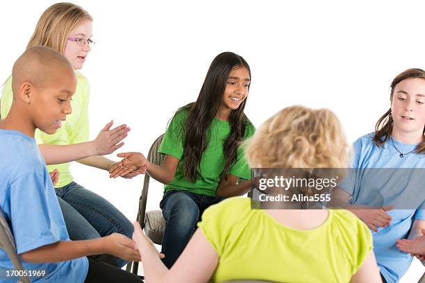 group of pre-teens children playing a game in circle - pre adolescent child bildbanksfoton och bilder