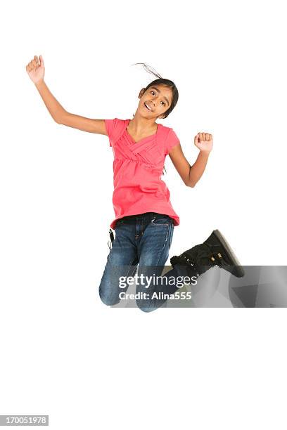 cute pre-teen indian girl jumping on white - 12 year old indian girl stock pictures, royalty-free photos & images