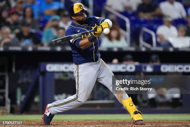 Carlos Santana of the Milwaukee Brewers at the plate against the Miami Marlins during the seventh inning at loanDepot park on September 24, 2023 in...