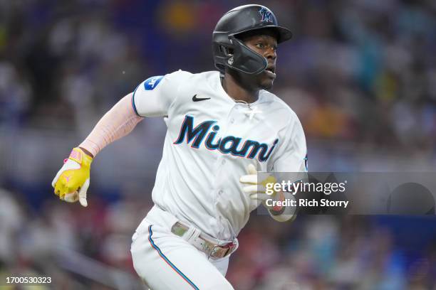 Jazz Chisholm Jr. #2 of the Miami Marlins runs to second base after hitting a double against the Milwaukee Brewers during the fifth inning at...