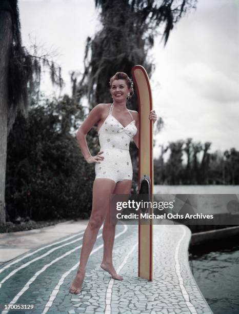 Aquatic film star Esther Williams poses for a portrait during the filming of 'Easy To Love' at Cypress Gardens theme park in 1953 near Winterhaven,...