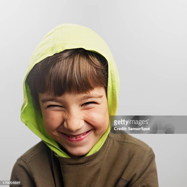child smiling - sneering stock pictures, royalty-free photos & images