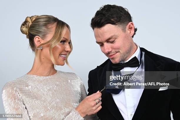 Lachie Neale of the Lions and wife Julie pose for portraits after Lachie Neale was awarded the Brownlow Medal during the 2023 Brownlow Medal at The...