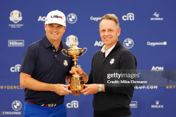 Zach Johnson, Captain of Team United States and Luke Donald, Captain of Team Europe pose with the trophy after a joint press conference prior to the...