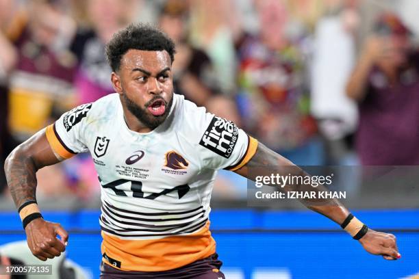 Ezra Mam of the Broncos celebrates scoring a try during the 2023 NRL Grand Final match between Penrith Panthers and Brisbane Broncos at Accor Stadium...