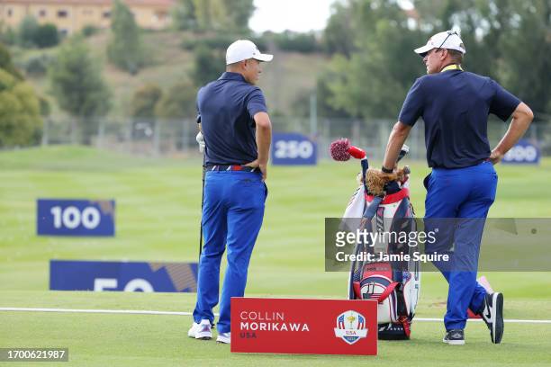 Collin Morikawa of Team United States talks with Steve Stricker, Vice Captain of Team United States on the practice area prior to the 2023 Ryder Cup...