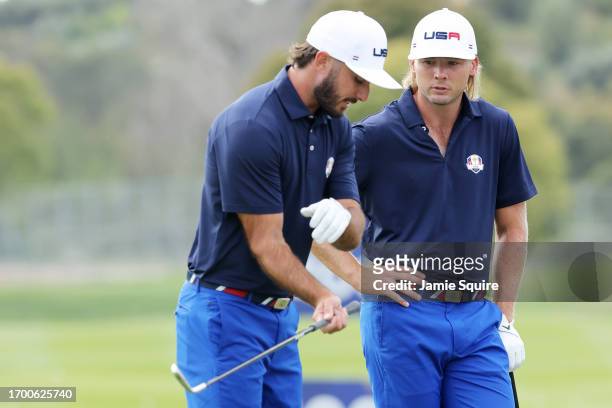 Max Homa of Team United States talks with Sam Burns of Team United States in the practice area prior to the 2023 Ryder Cup at Marco Simone Golf Club...