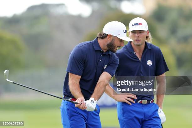 Max Homa of Team United States talks with Sam Burns of Team United States in the practice area prior to the 2023 Ryder Cup at Marco Simone Golf Club...