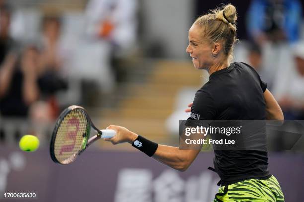 Arantxa Rus of the Netherlands in action against Linda Fruhvirtova of the Czech Republic during their round of 64 match on day 6 of the 2023 China...