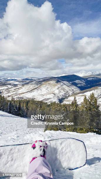 snowy mountain serenity: a snowboarder's perspective - ski pants stockfoto's en -beelden
