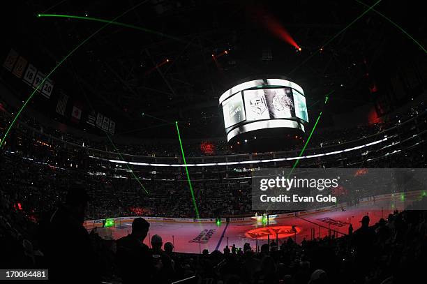 Lasers are emitted before player introductions of the Chicago Blackhawks and the Los Angeles Kings in Game Four of the Western Conference Final...