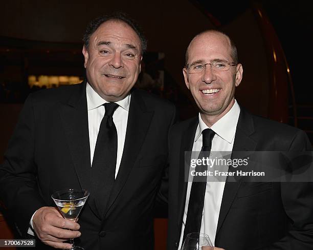Executive Vice President and Chief Communications Officer, CBS Corporation Gil Schwartz and producer Greg Garcia attend a reception at the 41st AFI...
