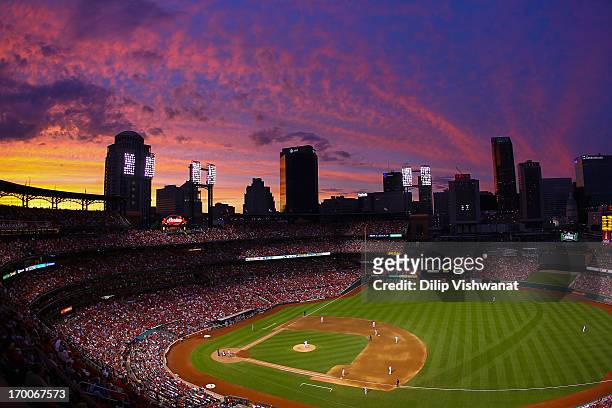 General view as the sunsets over Busch Stadium during a game between the St. Louis Cardinals and the Arizona Diamondbacks on June 6, 2013 in St....