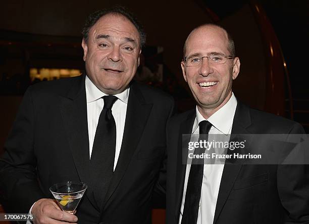 Executive Vice President and Chief Communications Officer, CBS Corporation Gil Schwartz and producer Greg Garcia attend a reception at the 41st AFI...