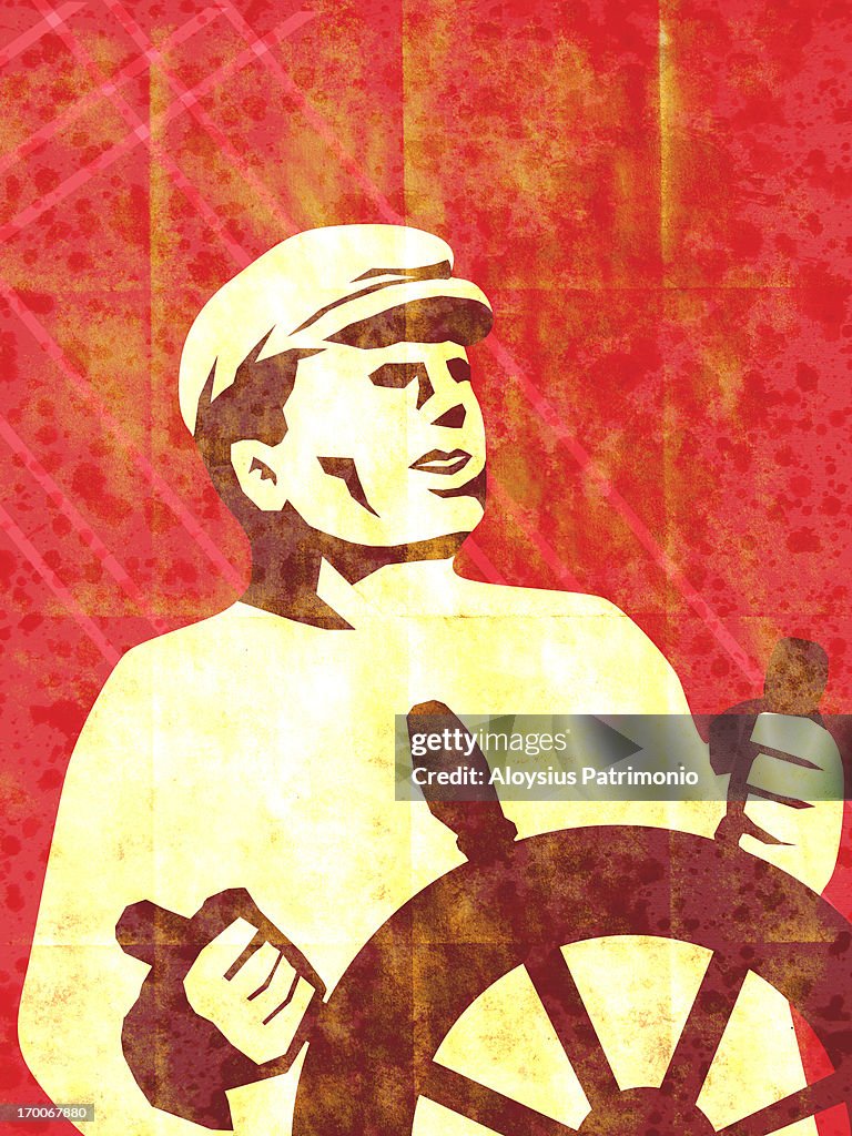 A man steering a ship