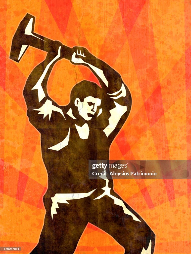 A blacksmith using a hammer