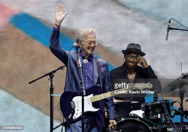 Eric Clapton waves to the fans after performing with Kurt Rosenwinkel onstage during Day 2 of Eric Clapton's Crossroads Guitar Festival at Crypto.com...