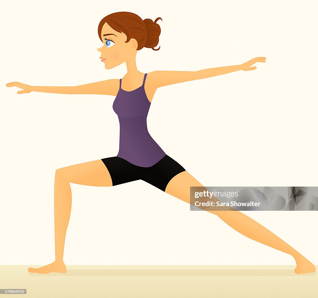 A woman doing the warrior yoga pose