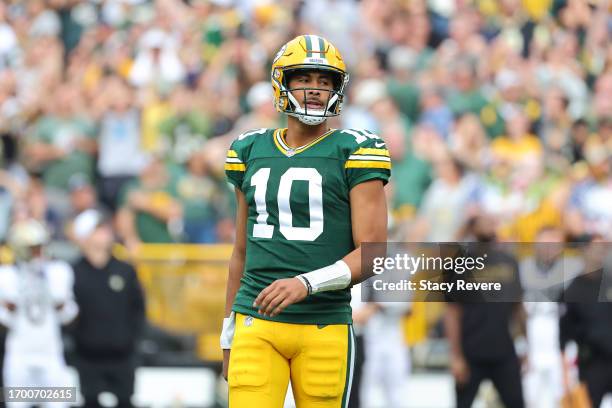 Jordan Love of the Green Bay Packers reacts to a play during a game against the New Orleans Saints at Lambeau Field on September 24, 2023 in Green...