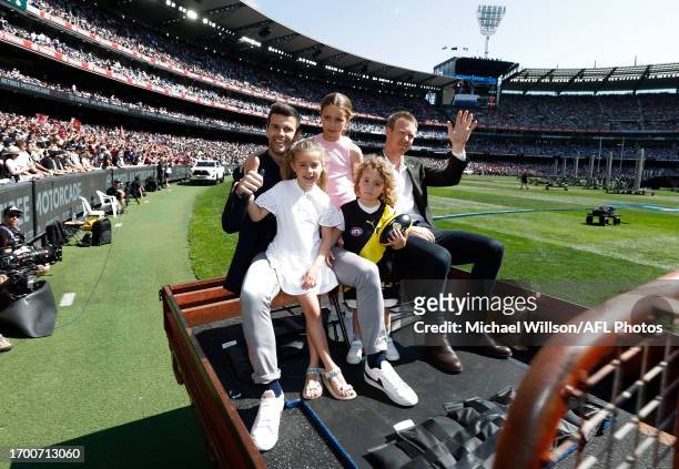 Trent Cotchin of the Tigers and Jack Riewoldt of the Tigers are seen during the 2023 AFL Grand Final match between the Collingwood Magpies and the...