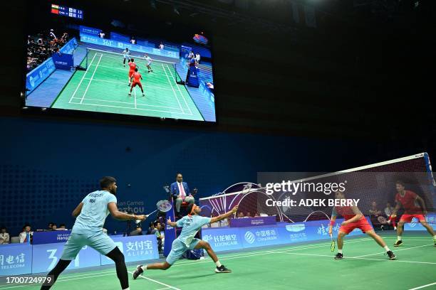 India's Chirag Chandrashekhar Shetty and Satwik Sairaj Rankireddy play a return against China's Liang Weikeng and Wang Chang at the men's double...